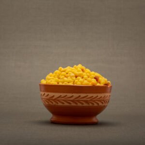 Bowl of golden ghee boondhi.